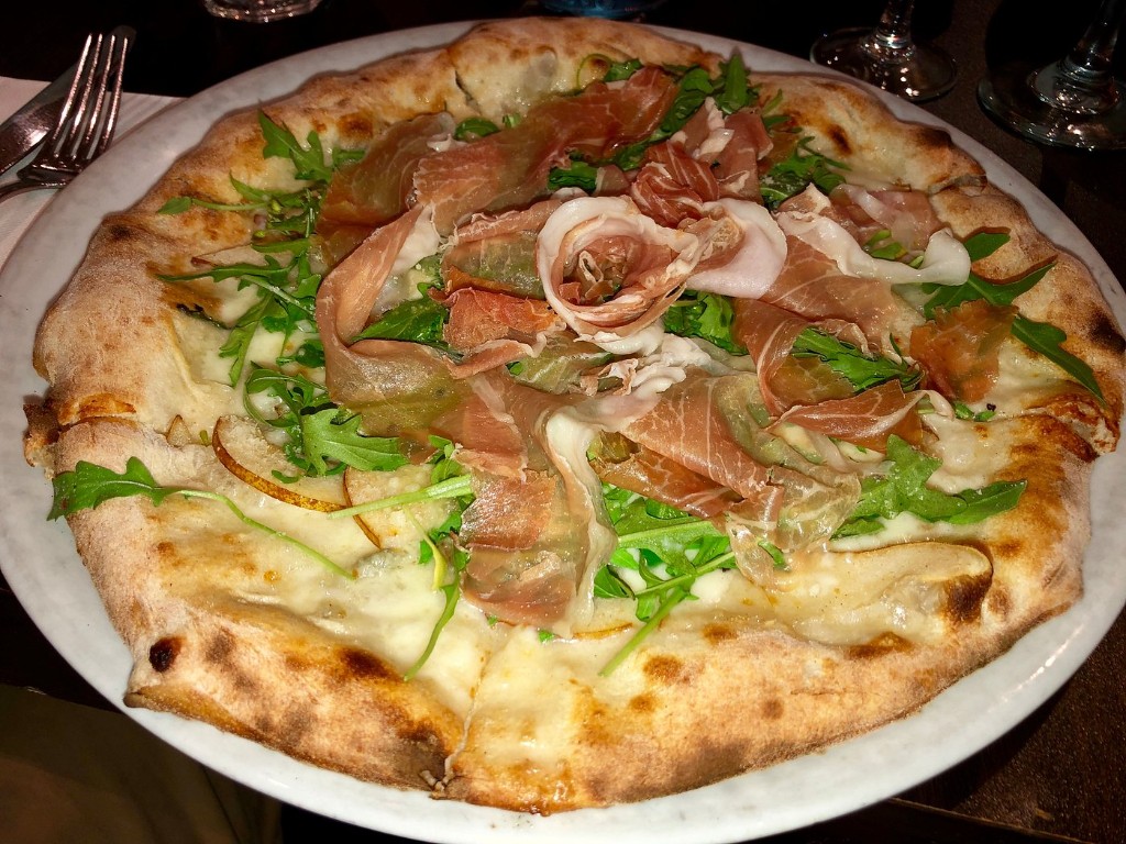 Cappello pizza with pear, prosciutto and rocket